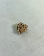 baby in cradle 9c gold textured charm showing bottom of charm with hallmark